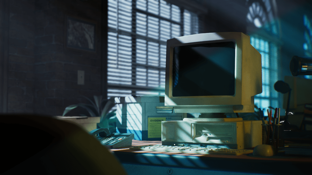 A scene of a police station. An old PC computer sits on a desk with a phone and case file box. Lighting is streaming into the scene from a semi-closed blind.