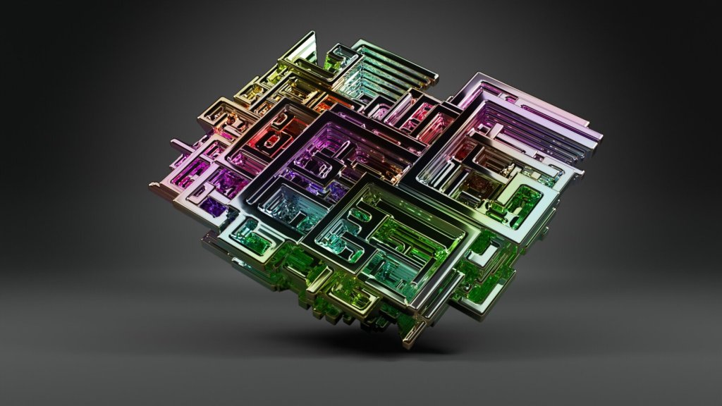 A chunk of bismuth forms sharp geometric fractals and is a beautiful rainbow color