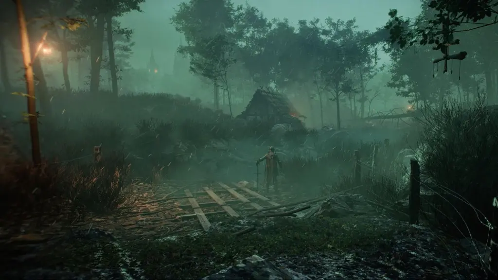 A spooky foggy forest scene, with a man obscured by fog